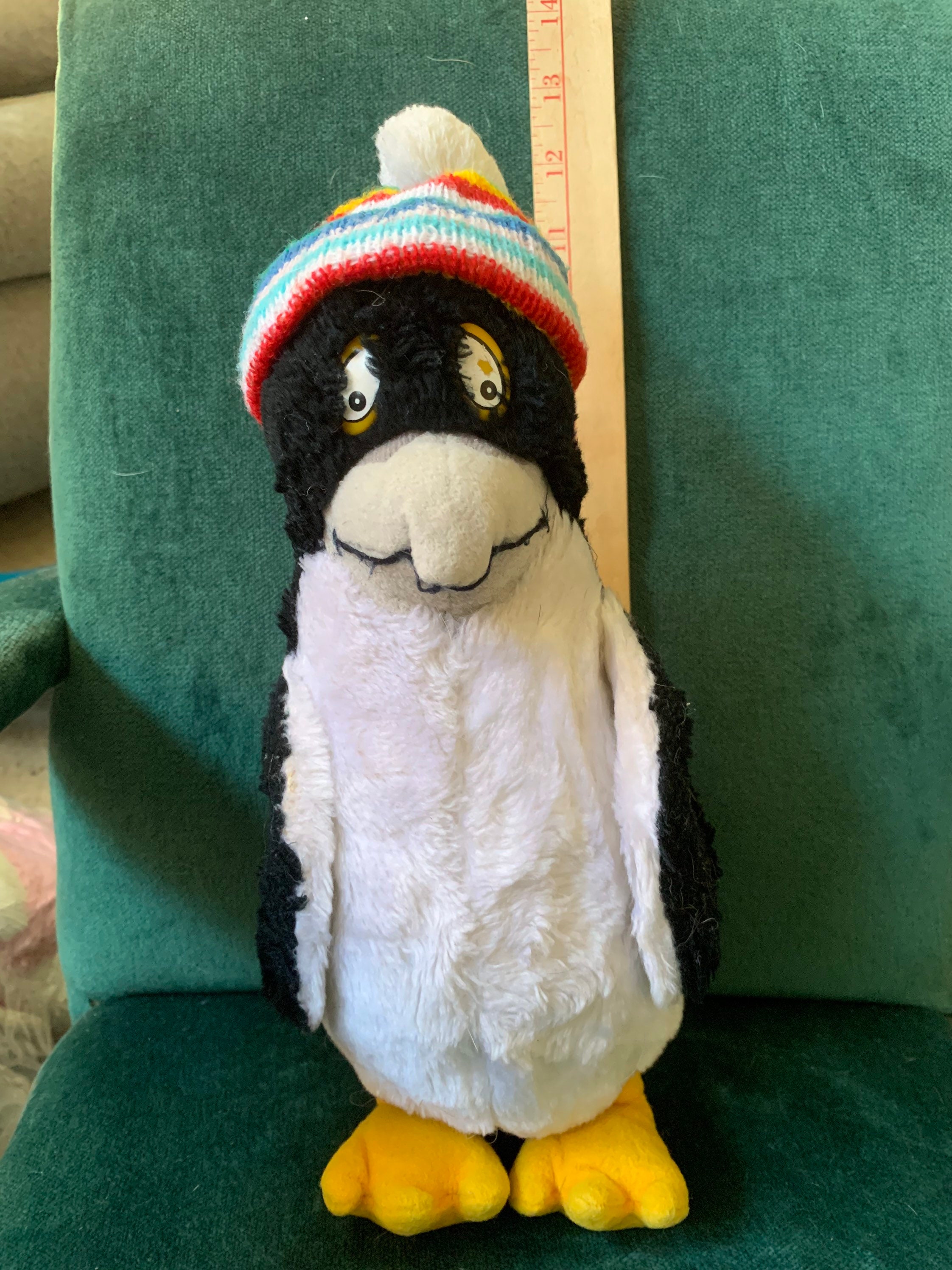 seaworld penguin toy on leash