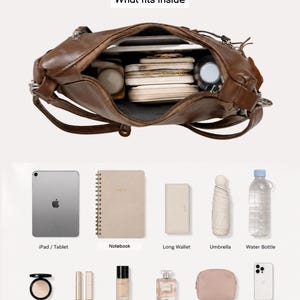 May include: A brown shoulder bag shown from an overhead perspective with an open main compartment containing various items. Below the bag, a collection of organized accessories includes a tablet, notebook, wallet, umbrella, water bottle, compact, lipstick, foundation, perfume, makeup pouch, and a phone.