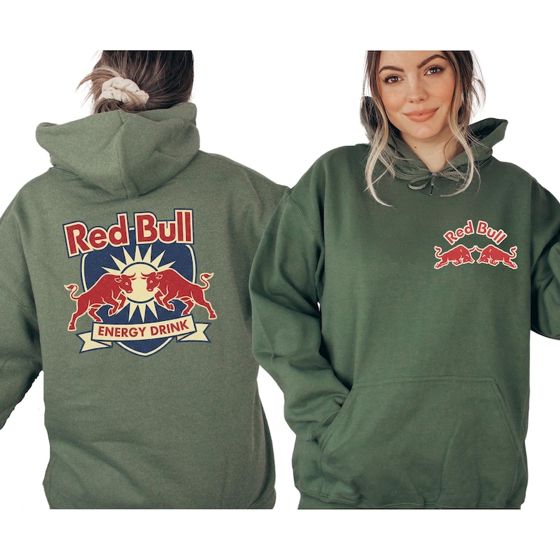 A woman wearing a green hoodie with the Red Bull logo and the text "Red Bull Energy Drink" printed on it.