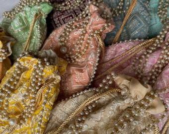 Intricate Chikankari Embroidered Potli Bags