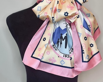 JJOA Ivory High Fashion Fleur de Lis Satin Scarf with Traditional seal logo