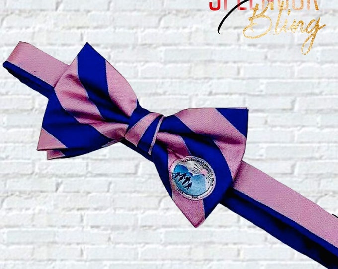 Featured listing image: Jack and Jill of America logo branded blue & muted pink pre-tied men’s bow tie