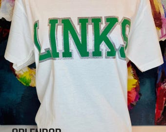 LINKS White/Green/Silver Glitter Trim t-shirt - The Links, Incorporated