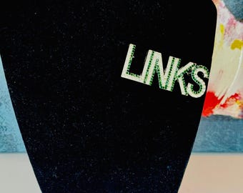 LINKS White Pearl and Green Rhinestone pin
