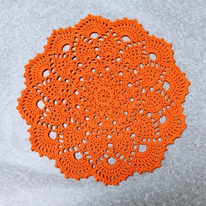 Small tangerine doilies available in single or pair (each priced separately)