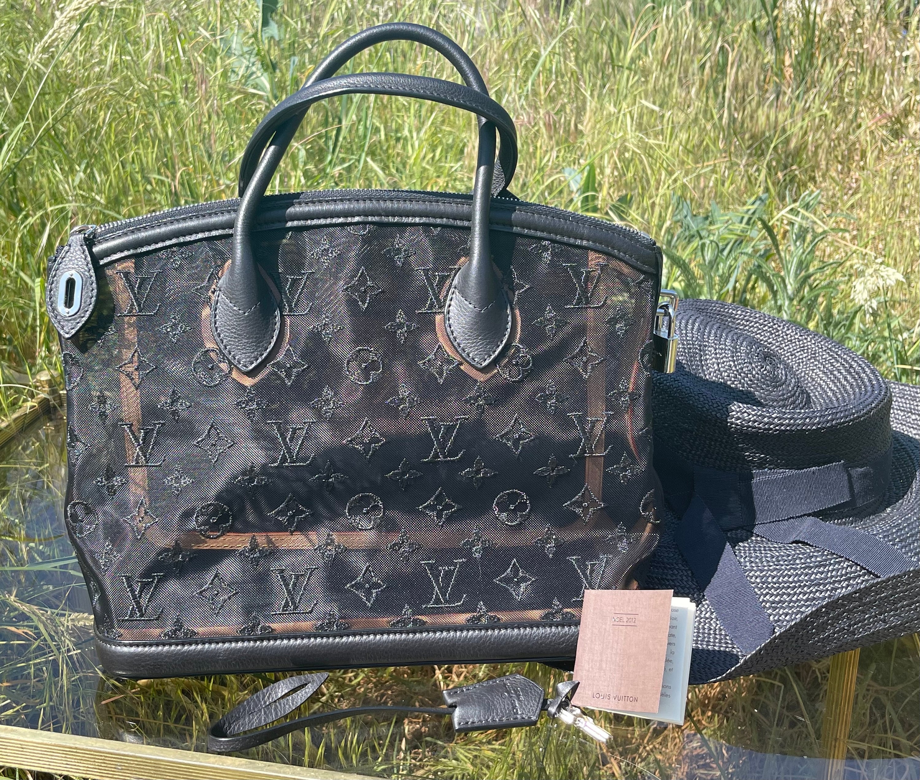 LOUIS VUITTON Vintage Monogram LockIt Handbag