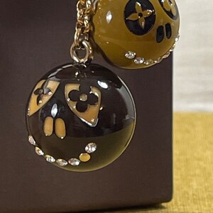 Louis vuitton jack and lucie charm hotsell