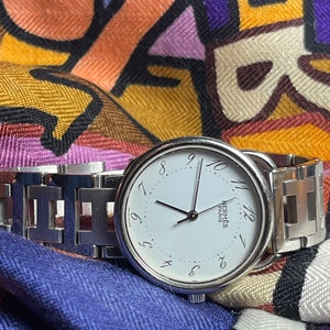Hermes watch bracelet steel H exceptional stainless steel round very extravagant extraordinary business fashion