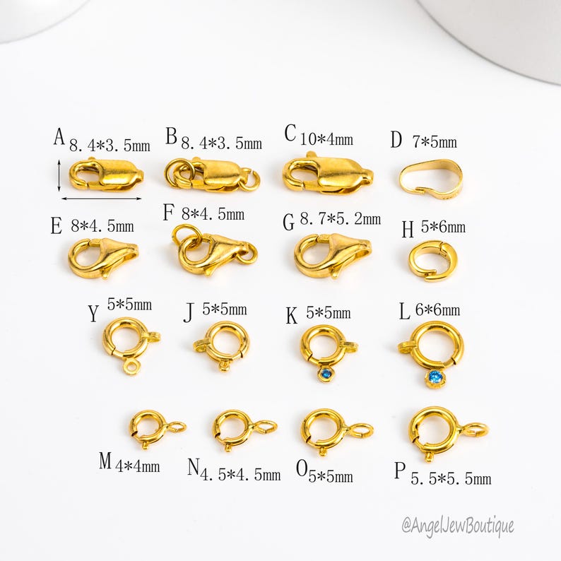 May include: A collection of gold-colored jewelry clasps and connectors in various styles and sizes. Includes lobster clasps, spring rings, and other clasp types. Measurements are provided in millimeters, with the smallest being 4mm and the largest 10mm.
