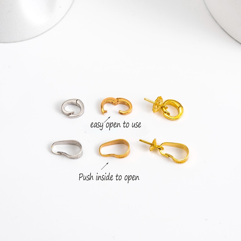 May include: An assortment of jewelry clasps in gold and silver tones. The clasps are in various shapes, including oval and circular designs. Text on the image reads "easy open to use" and "Push inside to open".