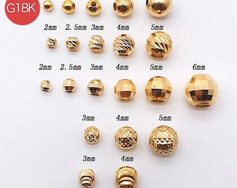May include: A collection of gold-colored beads in various sizes and styles, including smooth, faceted, and textured designs. Sizes range from 2mm to 6mm. The image includes the text "G18K" and "@AngelJewBoutique".