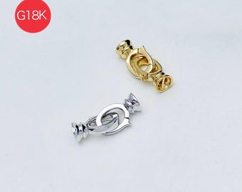 May include: Two jewelry clasps, one gold-toned and one silver-toned, featuring a polished finish and a secure locking mechanism. A red circle in the upper left corner contains the white text G18K, and the text AngelJewBoutique appears in the bottom right.