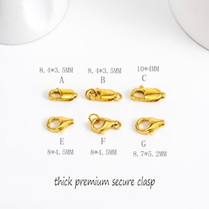 May include: A selection of gold-colored clasps in various sizes, including 8.4*3.5mm, 10*4mm, 8*4.5mm, and 8.7*5.2mm. The clasps are labeled A through G. The text "thick premium secure clasp" is also present.