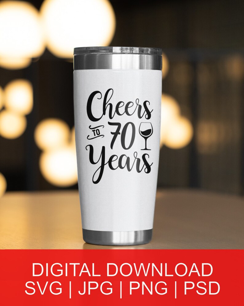 May include: White stainless steel tumbler with a black design that says "Cheers to 70 Years" with a wine glass icon.