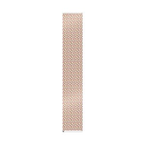 Full sheet of Krampus wrapping paper laid flat showing repeating pattern