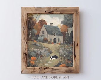 May include: A framed print of a quaint cottage scene in autumn colors. The artwork features a stone house with a dark roof, surrounded by trees and pumpkins. A black and white dog rests on a path. The frame is made of rustic, light-colored wood. The text "FOLK AND FOREST ART" is at the bottom.