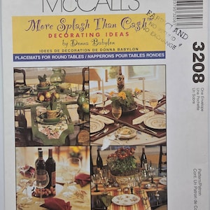 May include: A McCall's sewing pattern envelope 3208 titled More Splash Than Cash by Donna Babylon. The front features four colour photographs of table settings with placemats for round tables, including wine glasses, plates, and floral centrepieces.