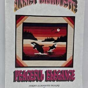 May include: A quilt pattern booklet titled Sunset Silhouette Peaceful Elegance by Carol Robinson. The cover features a graphic of two orcas jumping in water against a red and orange sunset, with silhouettes of trees, a moon, and birds.