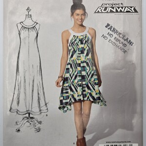 May include: A woman modelling a sleeveless dress with a geometric pattern in teal, black, and yellow. The dress has a white neckline and a flared skirt. The image is from Project Runway and includes the text "Fabric and No Refund No Exchange".