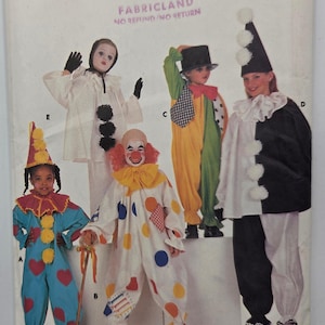 May include: A vintage sewing pattern showing various clown costume designs. The costumes include colourful jumpsuits, ruffled collars, and cone hats. The pattern is labelled "Fabricland" and includes various sizes for different ages.