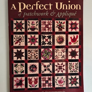 May include: A Perfect Union of Patchwork & Appliqué book cover. The cover is a deep burgundy colour with the title in gold lettering. It features a grid of colourful quilt blocks with floral and geometric designs.
