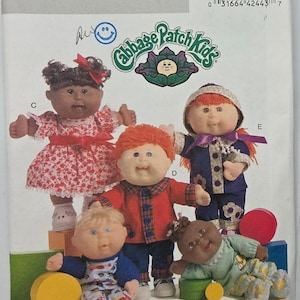 May include: A Butterick sewing pattern featuring Cabbage Patch Kids dolls. The pattern cover displays five dolls in various outfits, including dresses and overalls. The text "B5264 Butterick" is prominently displayed at the top.