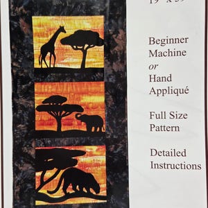 May include: A fabric wall hanging with a safari theme. The design features black silhouettes of a giraffe, trees, and an elephant against a sunset-colored background. The dimensions are 19 inches by 39 inches.