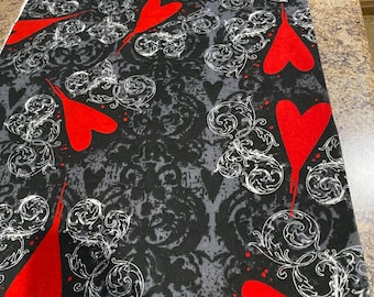 Pre-Shrunk Flannel Fabric, Black with Red Hearts BTY.
