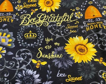 Bee Grateful with Sunflowers Black background 100% cotton fabric BTY