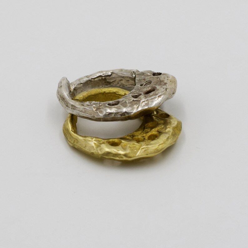 one sterling silver large stack ring and the same in bronze
