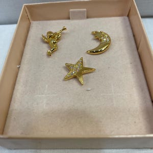 Kirks Folly Gold Tone Angel, Crescent Moon, and Star Pendant Set in Original Box