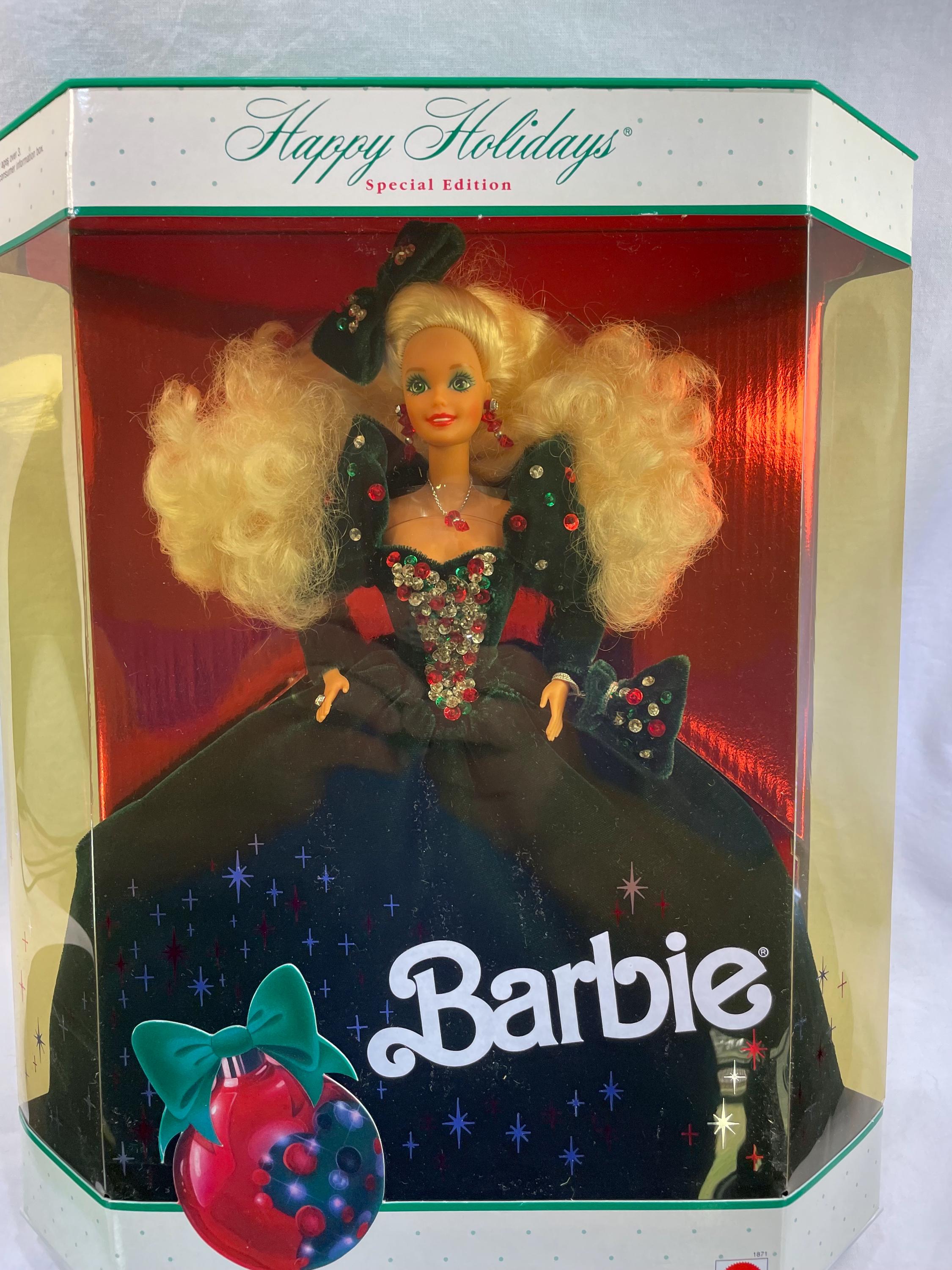 sachin and babi light blue dress 1991 Holiday Barbie! She is so beautiful! I love the bow in her hair! Her  green dress is a nice velvet type material. The green eyeshadow with the  red lip perfectly coordinates