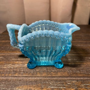 Northwood Blue Opalescent Alaskan Lions Leg Creamer