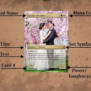 May include: A Magic: The Gathering card featuring a couple in wedding attire standing in front of a cherry blossom tree. The card is titled "Jasmine and Aiden" and has a mana cost of 4 white and 1 green. The card text reads "Vigilance. Whenever Jasmine and Aiden, Wed enters the battlefield or attacks, put a +1/+1 counter on each other creature you control. You gain 1 life for each other creature you control." The card has a power and toughness of 5/5.