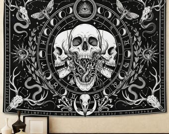 May include: Black and white tapestry featuring a gothic design. The tapestry showcases three skulls, a serpent, deer skulls, moths, and astrological symbols. The design includes a central circular pattern with various symbols and text.