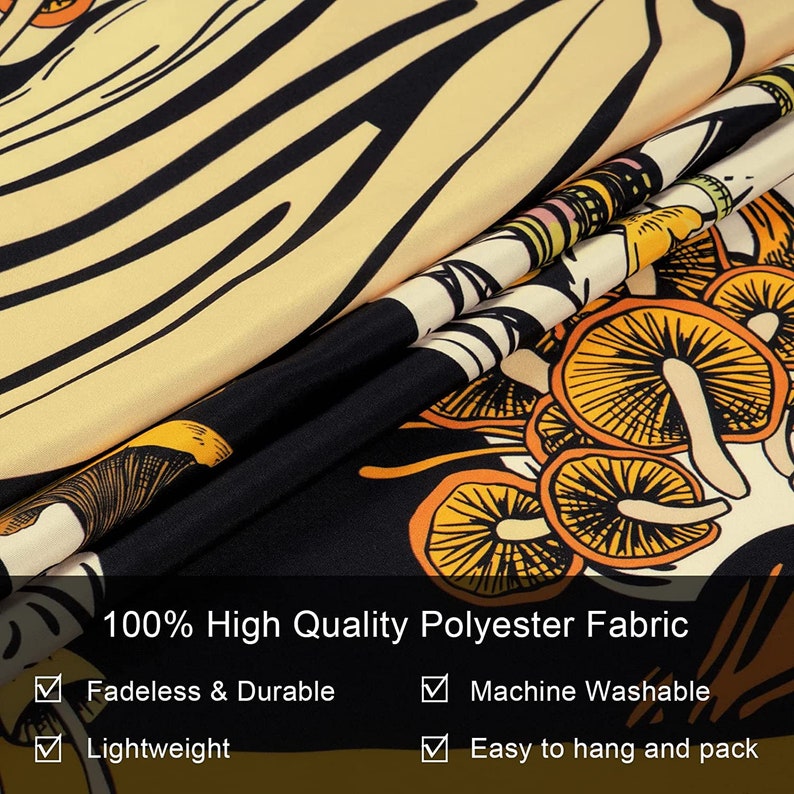 May include: A folded tapestry with a black, yellow, and orange mushroom design. The fabric is 100% high-quality polyester, fadeless, durable, lightweight, machine washable, and easy to hang and pack.