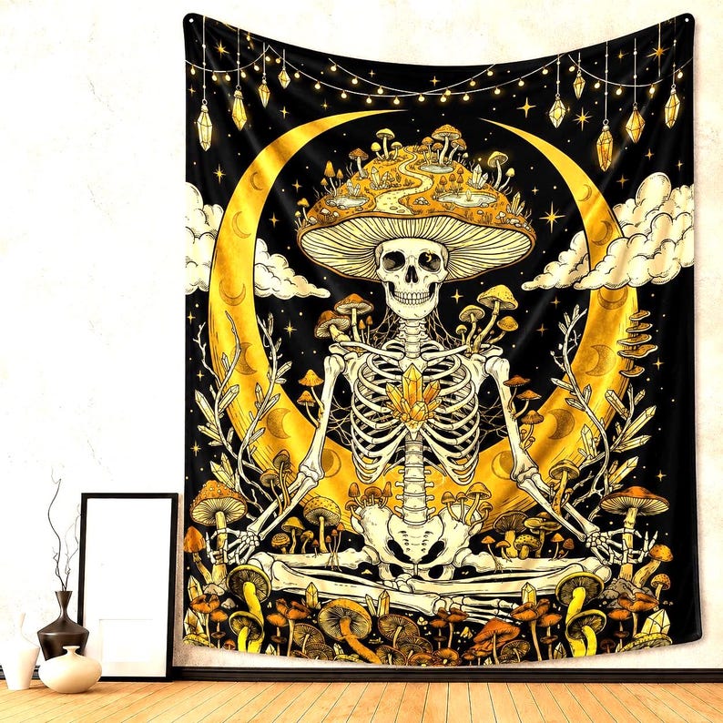 May include: Black tapestry featuring a skeleton meditating within a golden crescent moon, adorned with mushrooms and crystals. The design includes a mushroom-shaped hat and a starry night sky background. Decorative hanging lights add to the mystical theme.