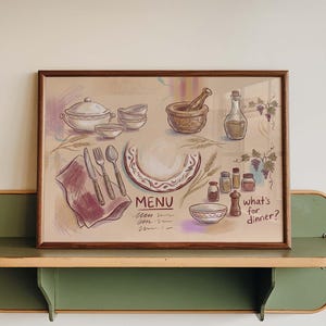 Pode incluir: Uma impressão emoldurada com uma ilustração de cozinha. A obra de arte inclui utensílios de cozinha, talheres e ingredientes, com as palavras "MENU" e "what's for dinner?". A impressão é exibida em uma prateleira verde e bege.