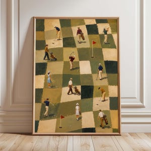 May include: A framed vertical art print featuring a checkered pattern of beige and dark green squares. Multiple figures are depicted playing golf, carrying clubs, and walking across the grid. Red flags mark holes on the green-toned surface.