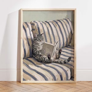 Reading cat wall art print, gray tabby book lover poster, cozy cottagecore pet decor, whimsical living room artwork