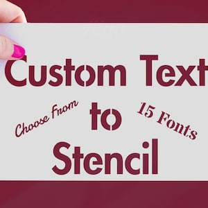 Puede incluir: Un esténcil blanco con las palabras "Custom Text to Stencil" en fuente rojo oscuro. El texto "Choose from" y "15 Fonts" también están incluidos en el diseño.