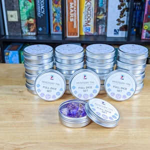 Mystery Tin of Dice Full Set of (7) Premium Dice in Every Tin - Grab Bag For All Dice Collectors Dice Goblins and Dragons