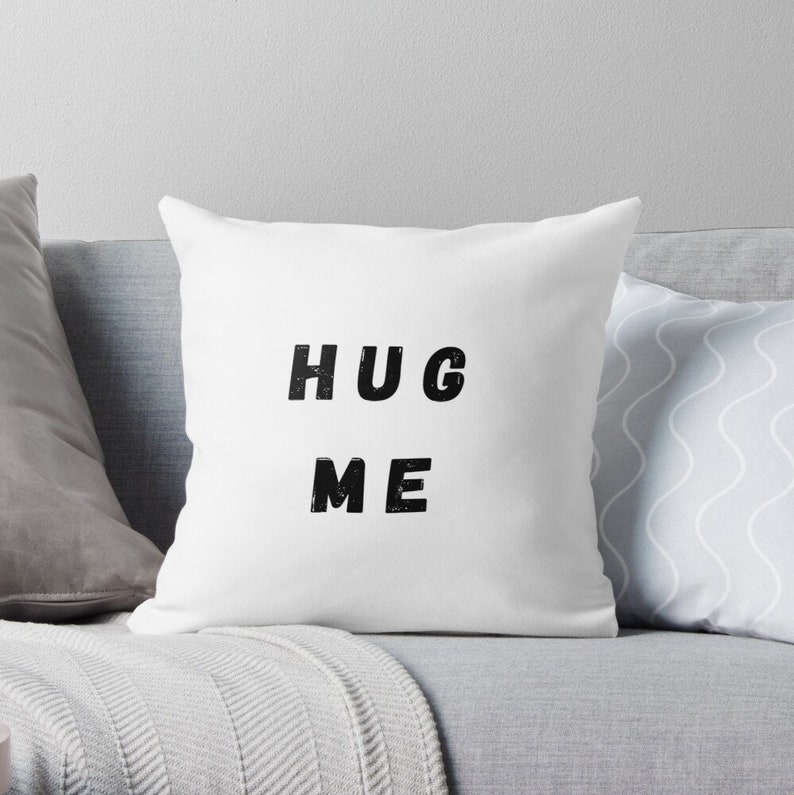 Cushion with Hug Me padding Cushion with message.