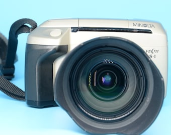 Minolta Vectis S-1 35mm SLR Camera with Minolta V Lens 25-150mm F4.5 Lens