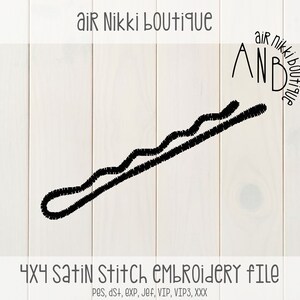 May include: Black and white embroidery design of a hair clip, 4x4 satin stitch embroidery file.  The design is labeled "AND" with the text "air nikki boutique" around it.