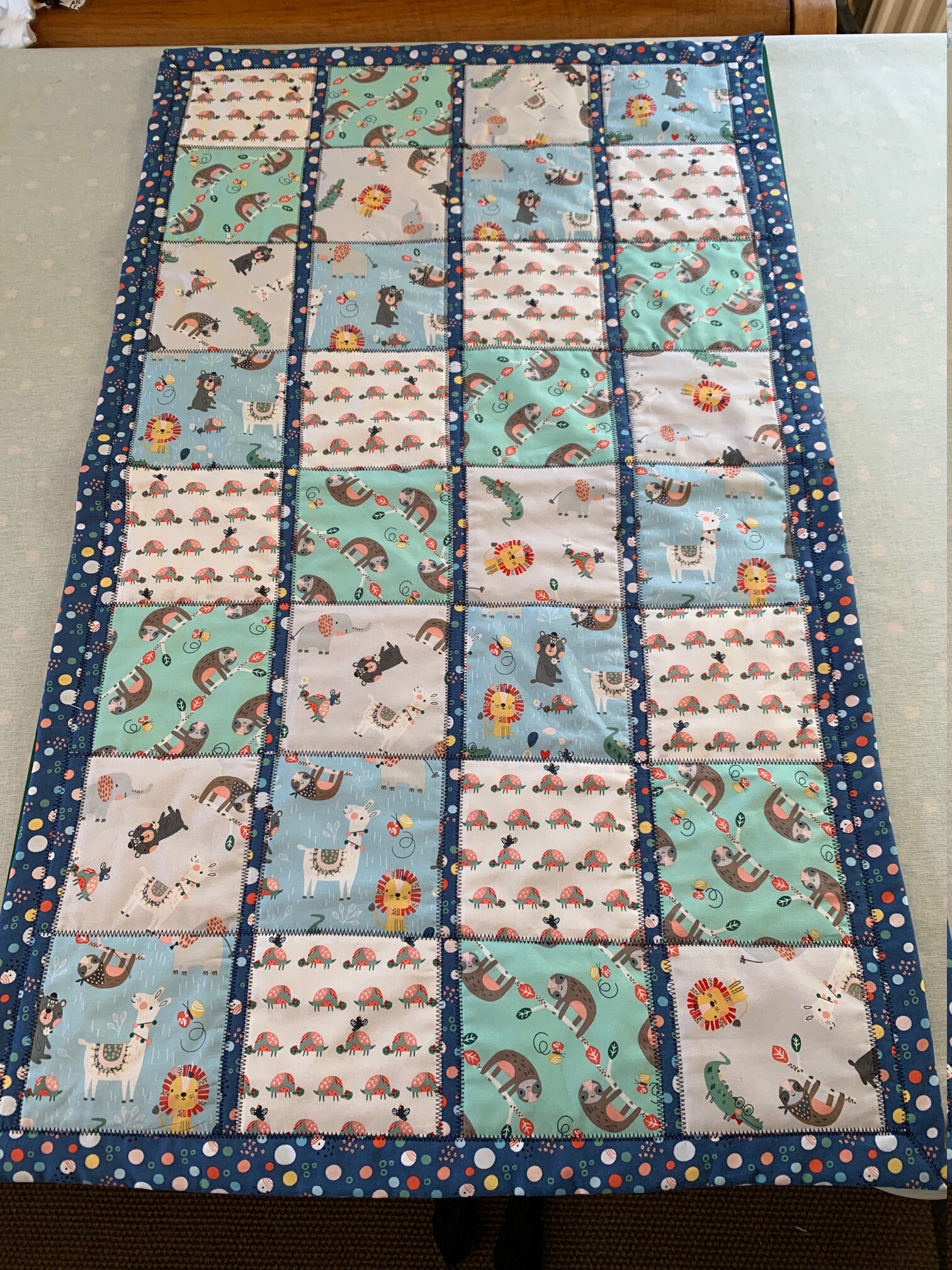 quilted cot blanket