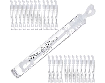 May include: A set of 20 clear plastic bubble wands with heart-shaped wands. The wands are personalized with the text "Maria & Markus 14.02.2023".