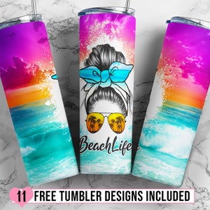May include: A stainless steel tumbler with a colorful sunset and ocean wave design. The tumbler features a woman with a bun and sunglasses, and the text "Beach Life".
