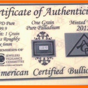 May include: Certificate of Authenticity for pure palladium. The certificate states the element is PD Pure with a fineness of 99.9. The net weight is 1 grain, with dimensions of approximately 3mm x 6mm. Minted in 2012 by American Certified Bullion.