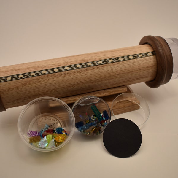 Handcrafted interactive kaleidoscope, it's new and it's like getting two kaleidoscopes In one package, our favorite classic scope.